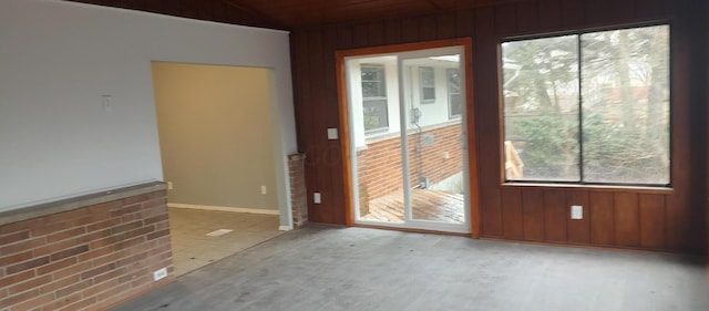 spare room featuring vaulted ceiling