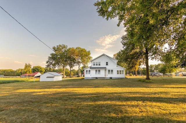 view of front of property with a yard