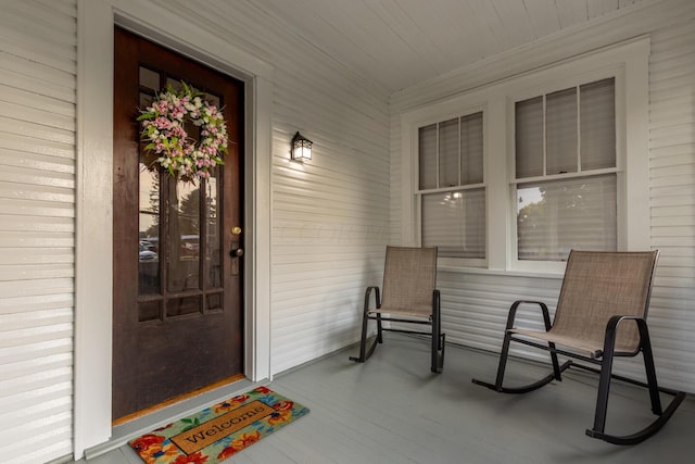 doorway to property with a porch