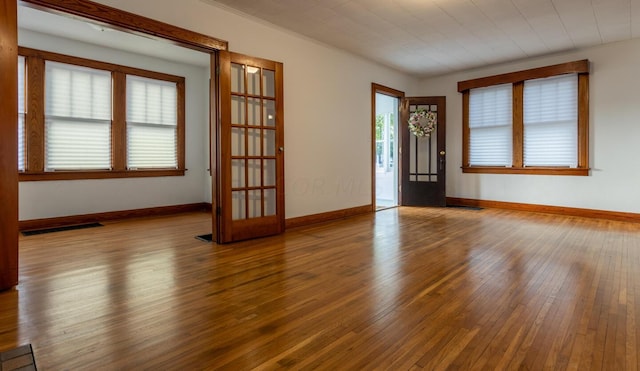 entrance foyer featuring hardwood / wood-style flooring