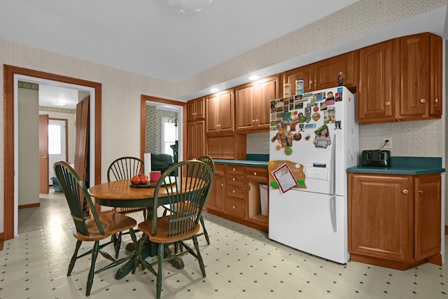 kitchen featuring white refrigerator