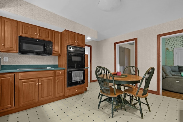 kitchen with black appliances