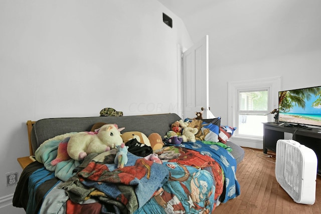 bedroom featuring light hardwood / wood-style floors