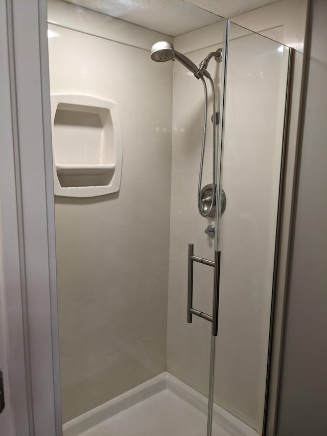 bathroom with walk in shower