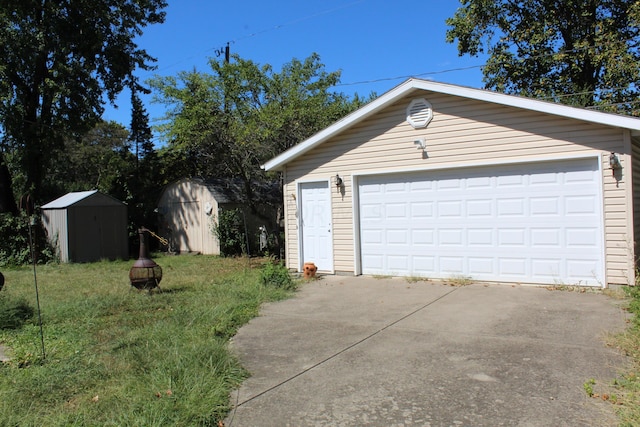 garage with a yard