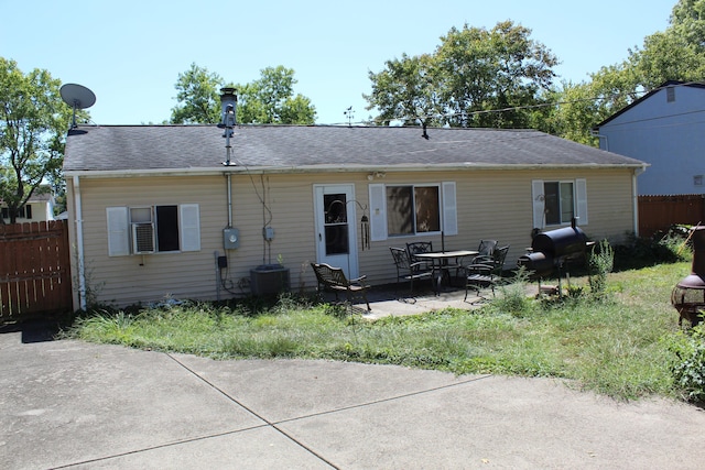 rear view of house featuring a patio area