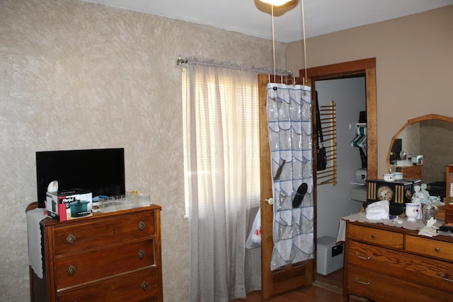 bedroom featuring hardwood / wood-style flooring