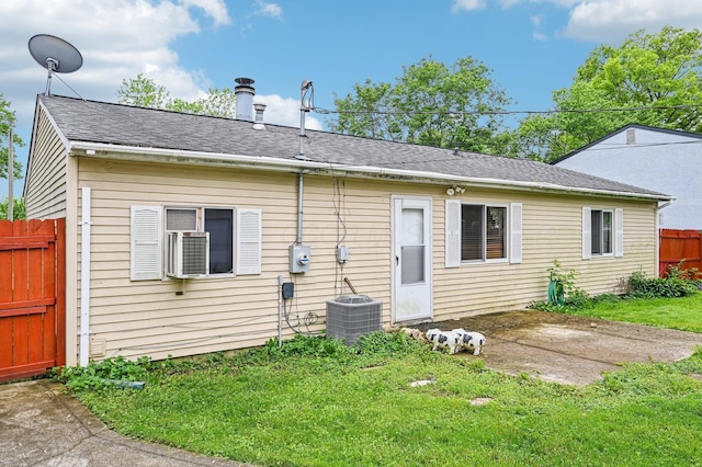 5010 Chipman Dr, Columbus, OH 43232 - back of property featuring central AC and a patio area