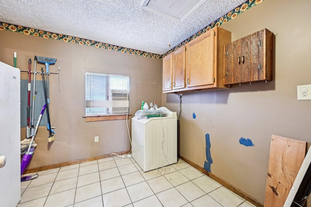 5010 Chipman Dr, Columbus, OH 43232 - laundry area with washer / clothes dryer, cabinet space, baseboards, and a textured ceiling