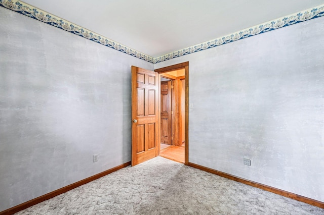 5010 Chipman Dr, Columbus, OH 43232 - carpeted empty room with baseboards