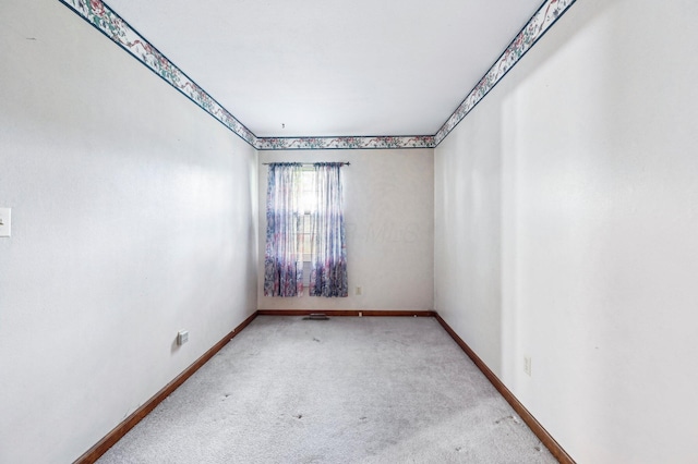 5010 Chipman Dr, Columbus, OH 43232 - spare room featuring baseboards and carpet flooring