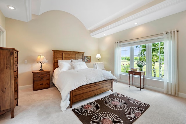 bedroom with baseboards, recessed lighting, vaulted ceiling, and light carpet