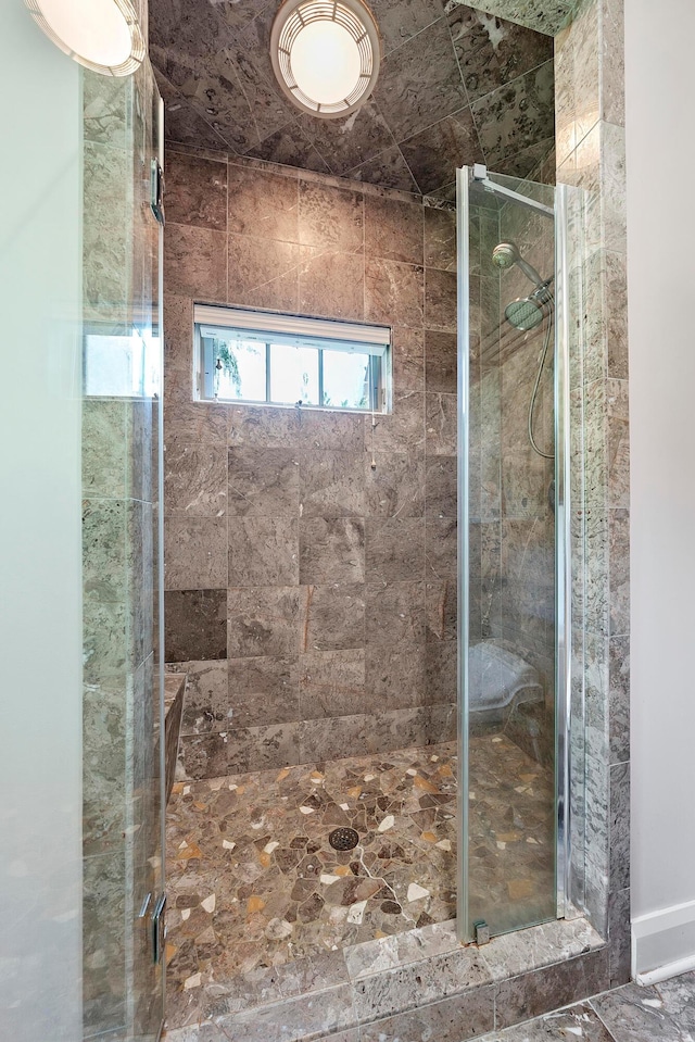 bathroom with a stall shower