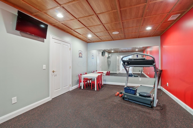 exercise room with recessed lighting, baseboards, visible vents, and wood ceiling