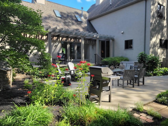 view of patio / terrace with a pergola, grilling area, and outdoor dining space