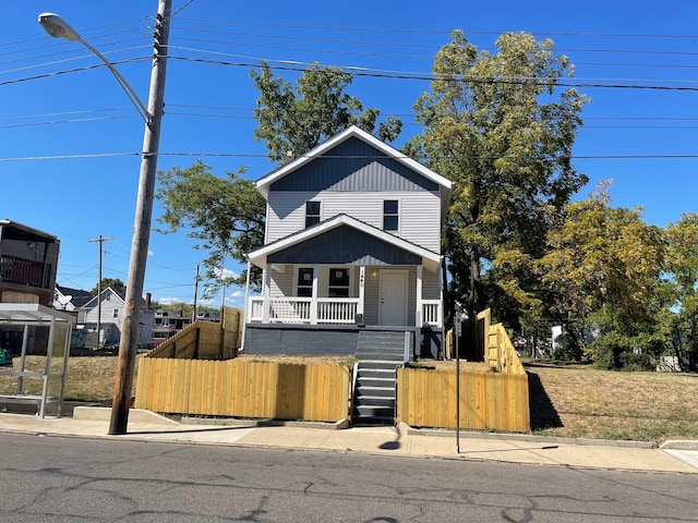 view of front of home featuring covered porch