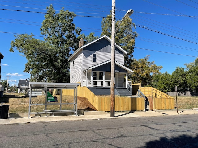 view of front property with covered porch