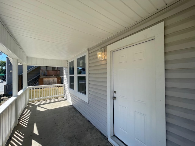 property entrance with a porch