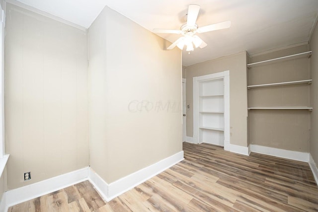 interior space featuring hardwood / wood-style flooring and ceiling fan