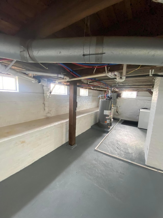 basement featuring gas water heater