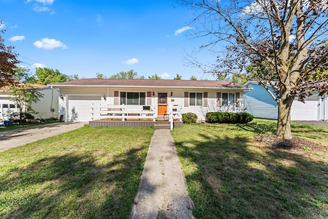 single story home featuring a front lawn, covered porch, and a garage