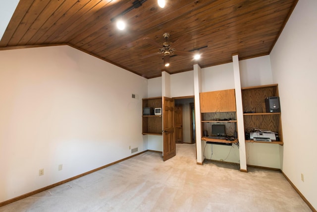 unfurnished living room with ceiling fan, light colored carpet, wood ceiling, and vaulted ceiling