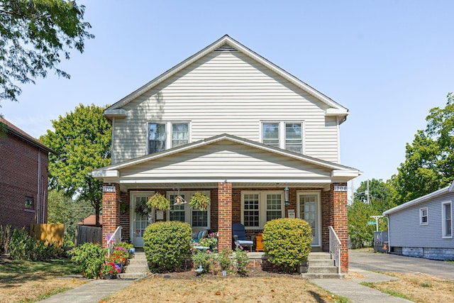 view of front of property featuring covered porch