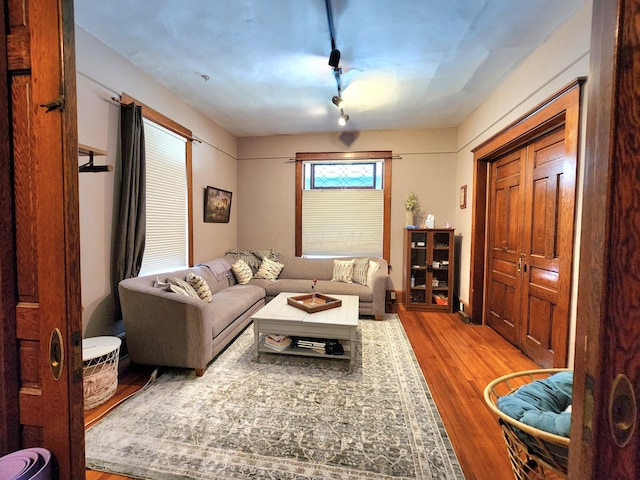 living room with light hardwood / wood-style floors