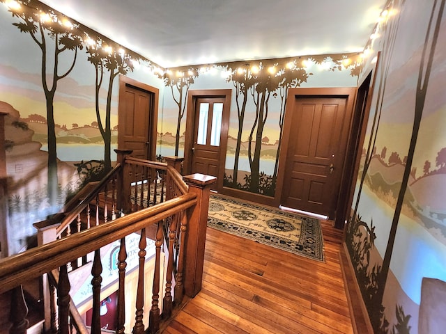 entryway with wood-type flooring