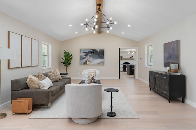 living room with lofted ceiling, light wood-type flooring, and an inviting chandelier