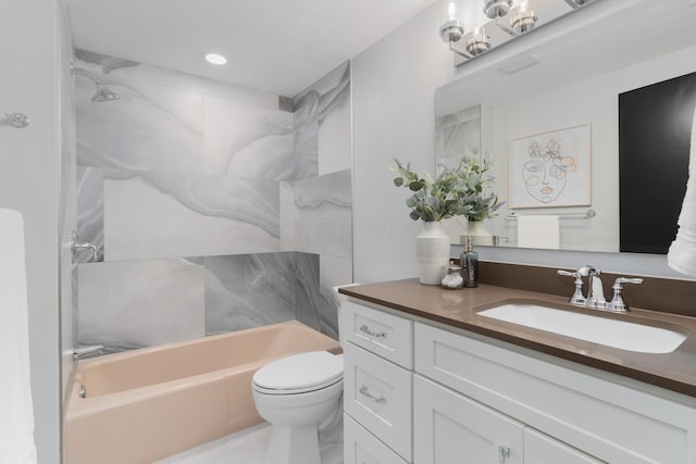 full bathroom featuring washtub / shower combination, vanity, and toilet