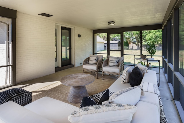 sunroom with a healthy amount of sunlight