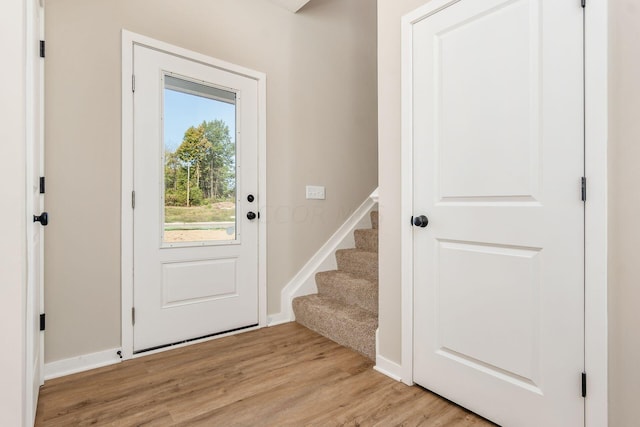 doorway to outside with light hardwood / wood-style flooring