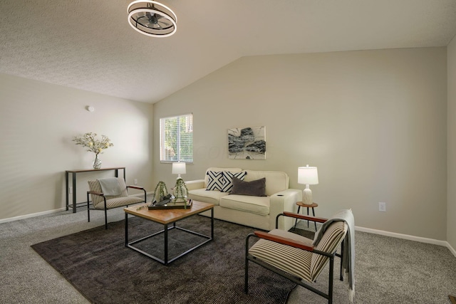 living room featuring carpet and vaulted ceiling