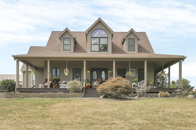 farmhouse inspired home with a porch and a front lawn