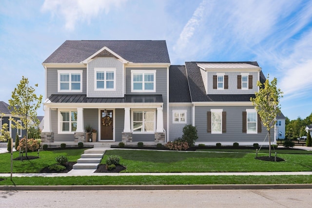 view of front of home featuring a porch and a front yard