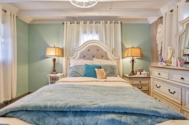 bedroom with ornamental molding