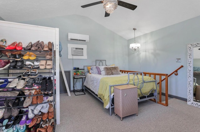 carpeted bedroom with baseboards, lofted ceiling, a wall mounted air conditioner, an AC wall unit, and ceiling fan with notable chandelier