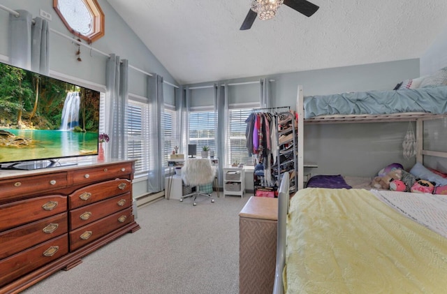 bedroom with lofted ceiling, light carpet, ceiling fan, and a textured ceiling