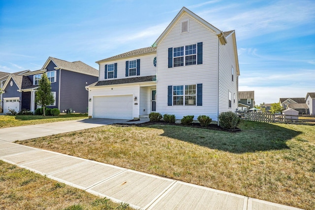 view of front property with a front yard and a garage