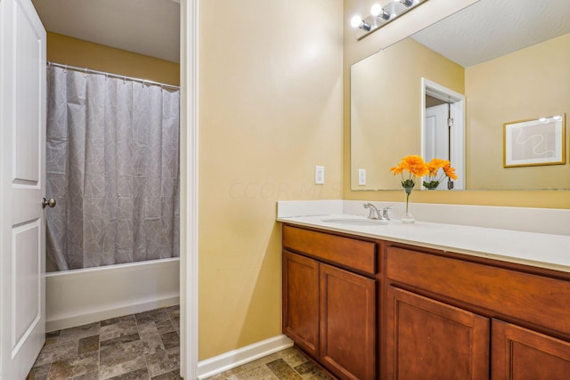 bathroom featuring shower / tub combo with curtain and vanity