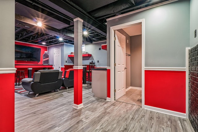 basement with wood-type flooring