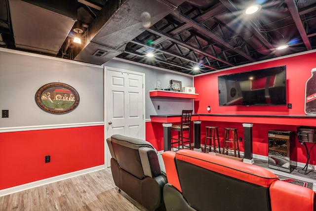 home theater featuring wood-type flooring