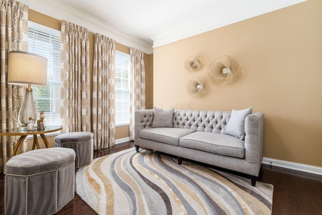 living area featuring hardwood / wood-style flooring and ornamental molding