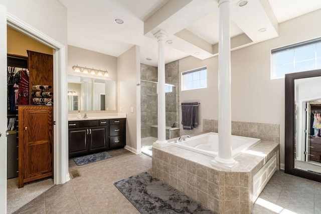 bathroom with separate shower and tub, tile patterned floors, decorative columns, and vanity