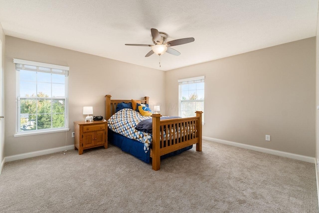 bedroom with carpet floors and ceiling fan