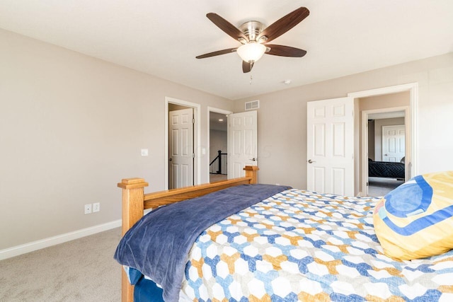 carpeted bedroom featuring ceiling fan