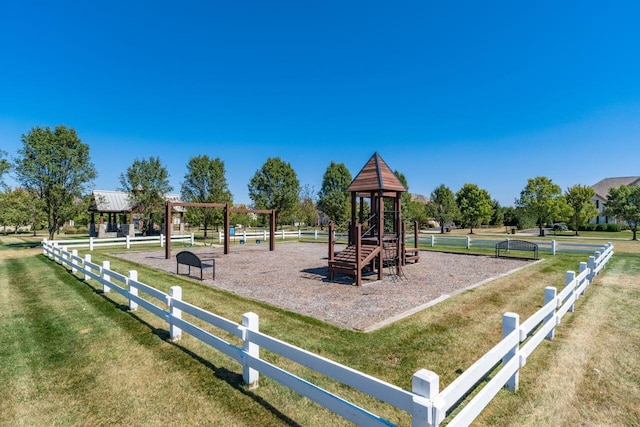 view of jungle gym featuring a yard