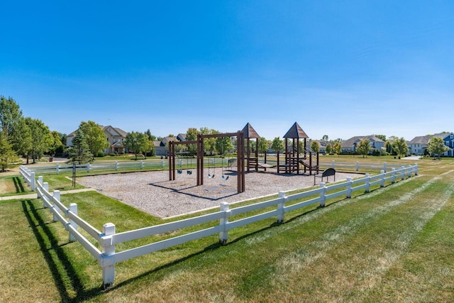 view of playground featuring a lawn