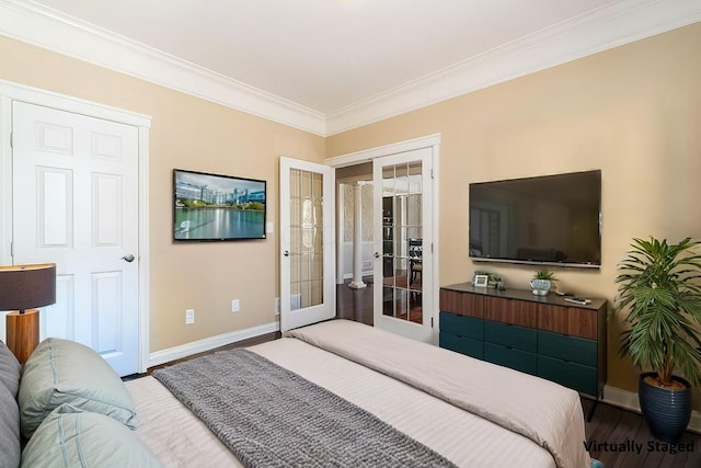 bedroom with wood-type flooring, crown molding, and french doors